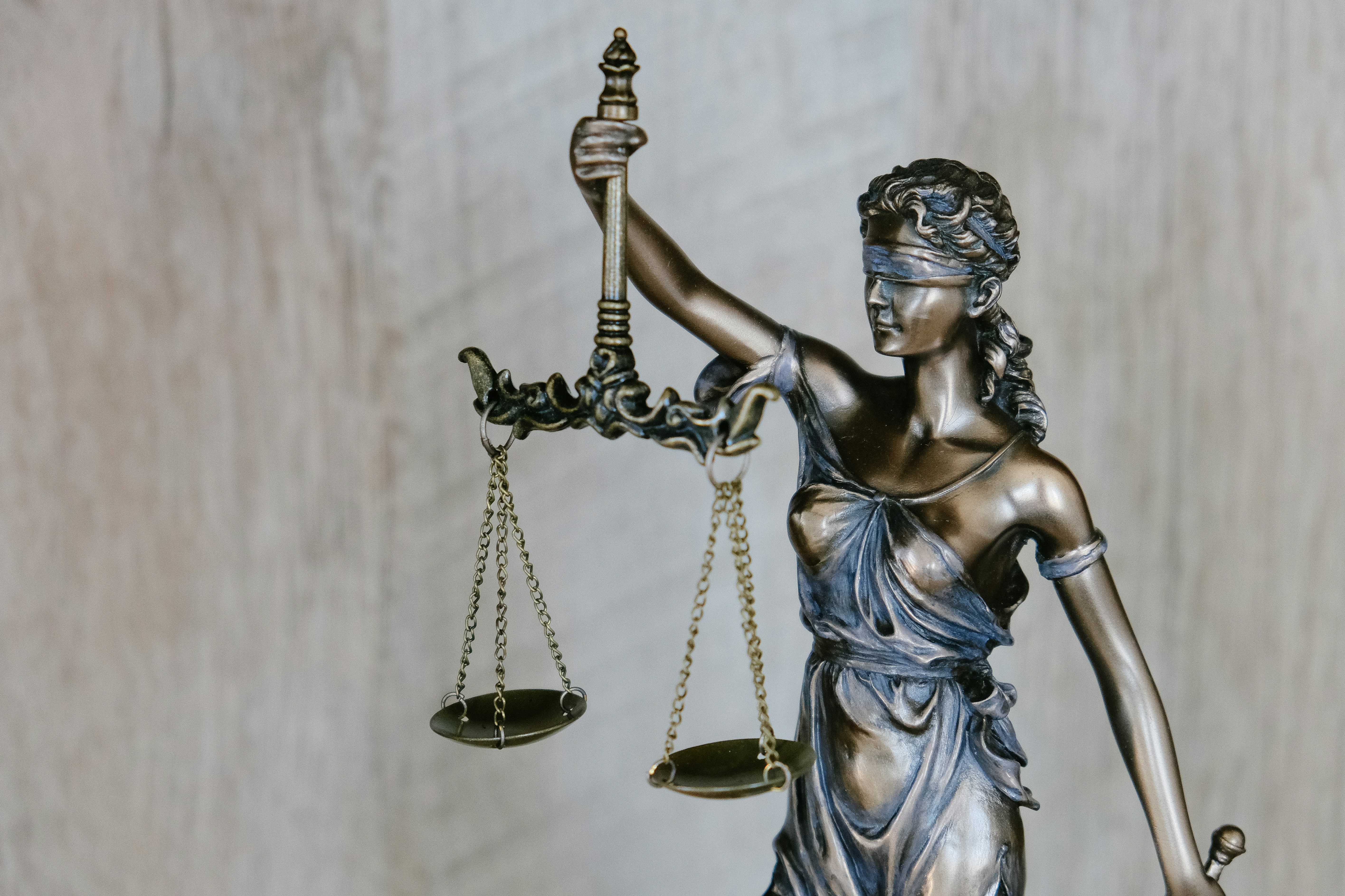 Scales of justice representing balance and legal precision
